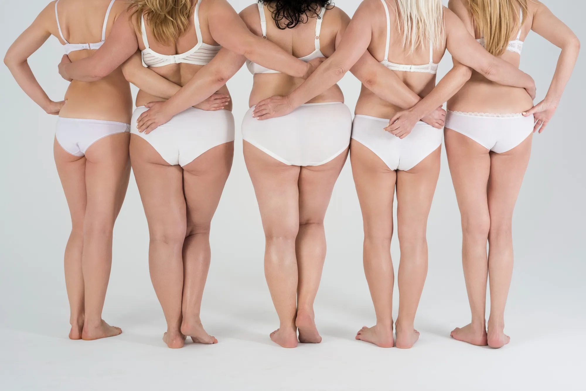 Women in white underwear seen from behind